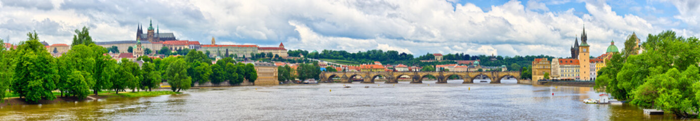 Fototapeta na wymiar Panorama in Prague - with Charles Bridge and Hradcany hill