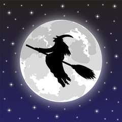 silhouette of a witch on a background of the full moon