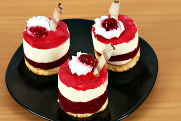 three raspberry cake on dish