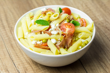 Italian Penne Pasta Salad With Mozzarella, Tomatoes And Ham