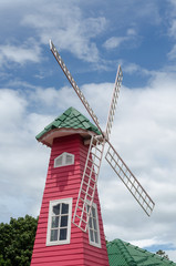 The wood wind mill and sky