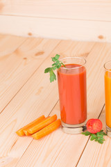 Tomato juice on wood table.