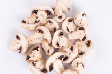 Heap of sliced champignon mushrooms.