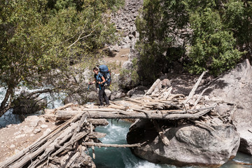 Fototapeta premium Hiker in high mountains.