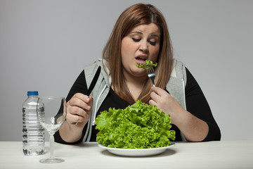 Sad woman on diet - obrazy, fototapety, plakaty