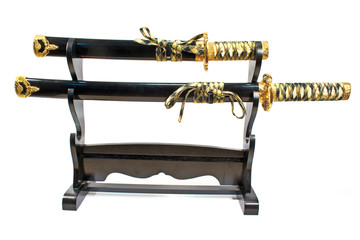 Japanese samurai katana swords  on stand isolated on white