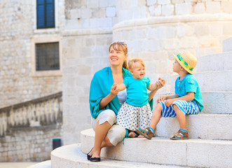 mother with kids on vacation in Europe