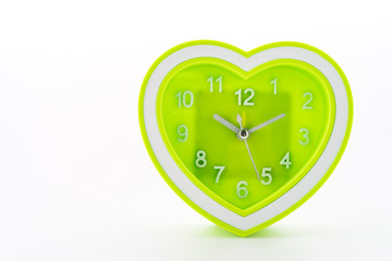 Heart green clock isolated on white background