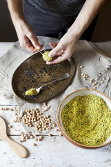 male hands preparing homemade falafel with chickpeas flour