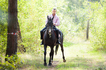 handsome man on horse
