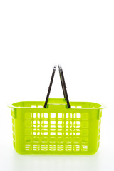 Fototapeta premium Shopping plastic basket isolated on white background