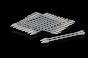 cotton buds on blackground