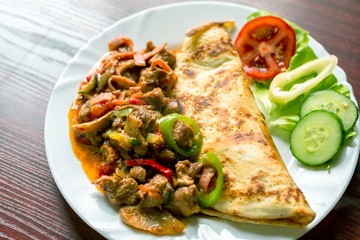 Delicious food on white plate