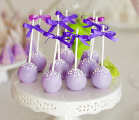 Sweet holiday buffet with cake-pops on sticks