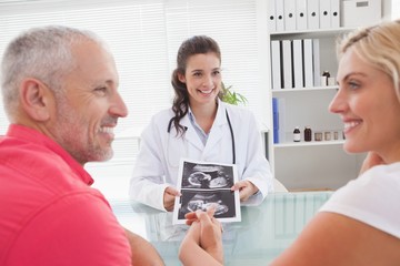 Smiling patient consulting a doctor