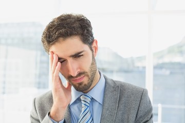 Businessman suffering from a headache