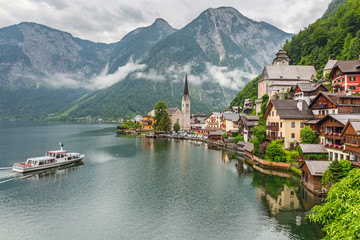 Fototapeta na wymiar Hallstatt village in Alps at cloudy day, Austria