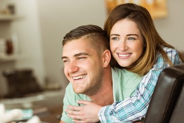 Cute couple relaxing on couch