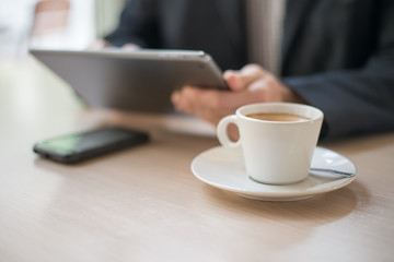 Man uses a digital tablet