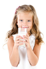 Smiling little girl drinking milk isolated