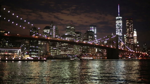 Brooklyn Bridge and Downtown Skyscrapers in New York at Night
