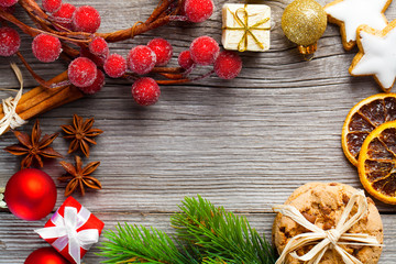 Christmas decoration on wood background, with free space for you