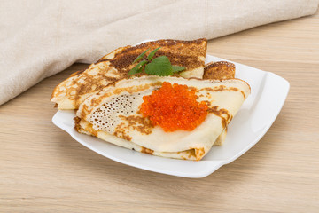 Pancakes with red caviar