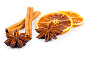 dry orange, cinnamon and Star Anise with copy space, on white ba