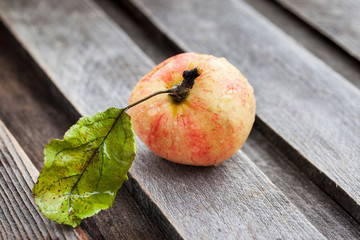 Apple on wooden table
