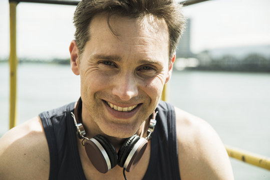 Portrait of smiling man with headphones