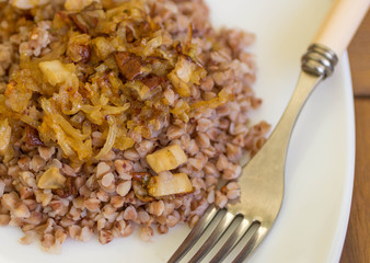 buckwheat porridge with fried onions and mushrooms