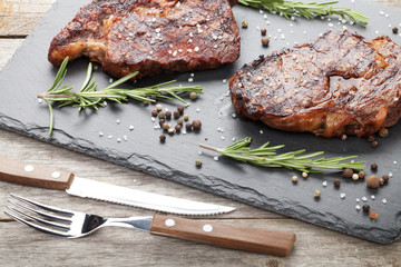 Beef steaks with rosemary and spices