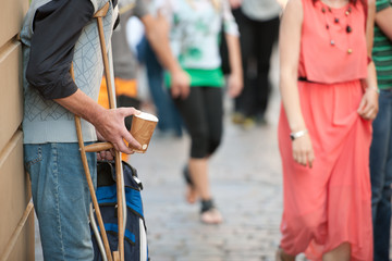 Disabled man is begging on the street