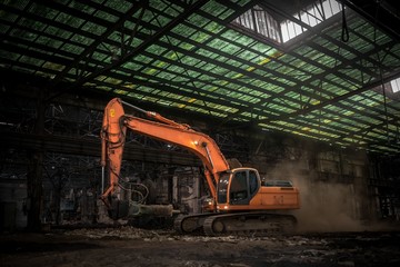 Industrial interior with bulldozer inside