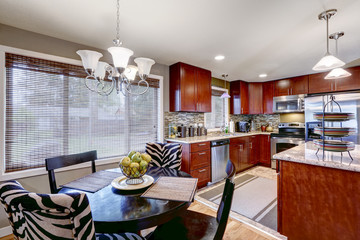 Modern kitchen interior with dining area