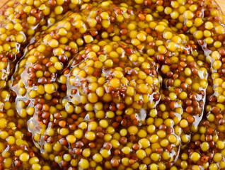 Dijon mustard macro. Top view.