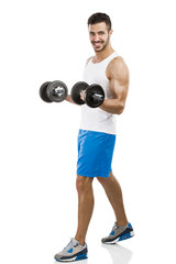 Athletic man lifting weights