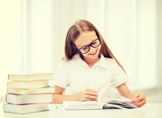 student girl studying at school