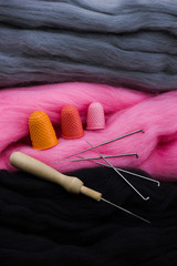 Tools for felting on a background of wool