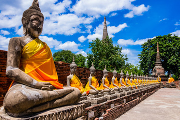 Thailand, row of Buddha images in Ayutthaya old Temple