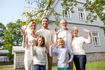 happy family in front of house outdoors