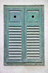 Obraz na płótnie Canvas Closed wooden window shutters