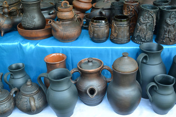 Fototapeta na wymiar Ceramic ware of handwork at fair of national creativity