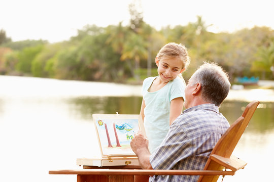 Grandfather With Granddaughter Outdoors Painting Landscape