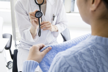 Doctor for examination with a stethoscope