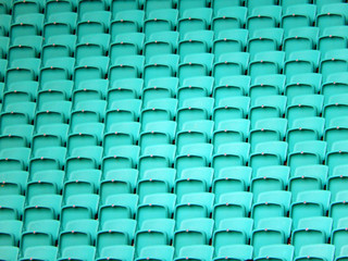 light green stadium chairs background