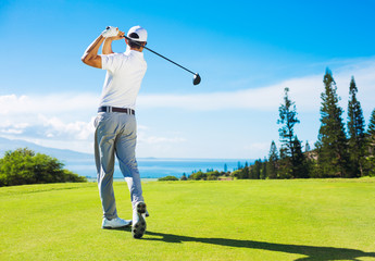 Man Playing Golf, Hitting Ball from the Tee - 70874497