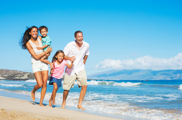 Happy Family on the Beach - 70874601