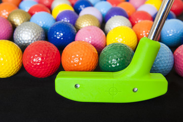 Colorful Golf Balls with Green Club
