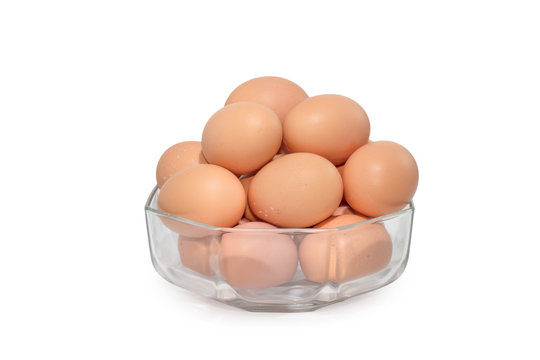 eggs in transparent bowl isolated on white